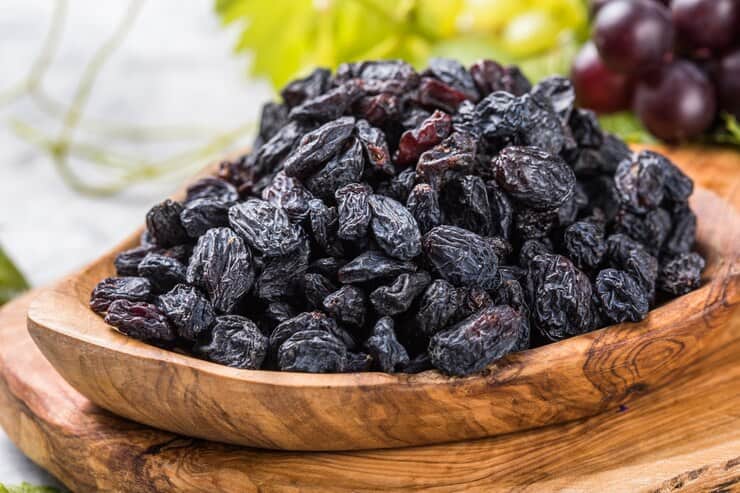 black-raisins-bowl-stone-background_154293-5949 (1)