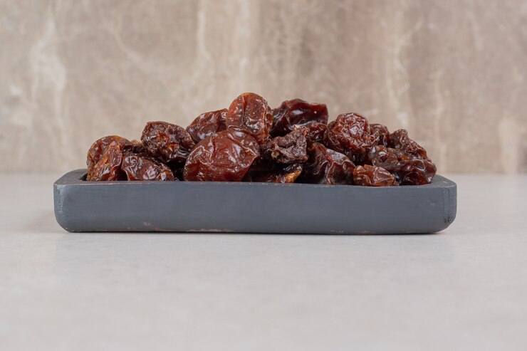 brown-dried-cherries-wooden-platter_114579-25271