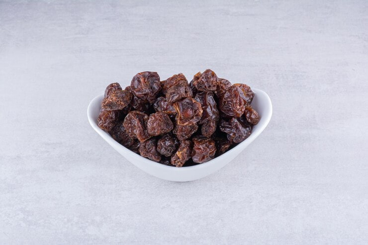 dried-sour-cherries-cup-concrete-background-high-quality-photo_114579-67525 (1)