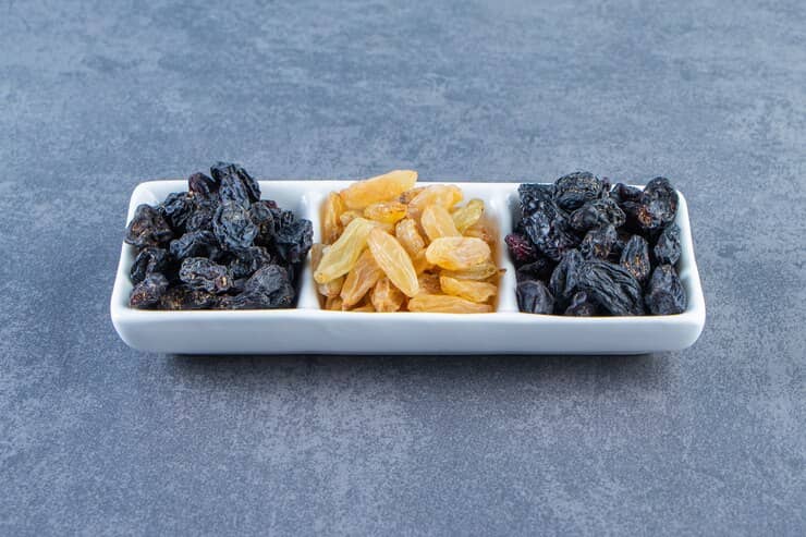 flavorful-raisins-dish-marble-surface_114579-84059 (1)