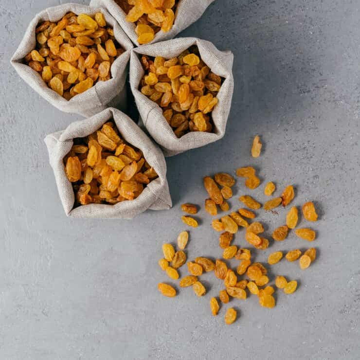 golden-raisins-from-dried-grapes-burlap-textile-sacks-photographed-from_95891-1537 (1)